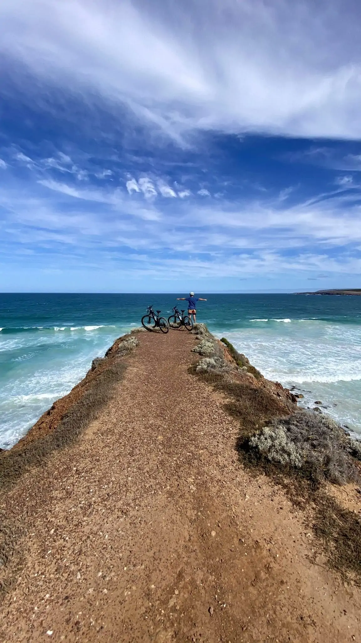 bikes parked on the cliff edge at the beach